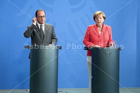 Angela Merkel receives François Hollande and Petro Poroshenko