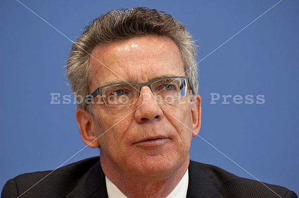 Press conference of Dirk Niebel, Thomas de Maizière and Guido Westerwelle